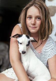 Portrait of freckled girl with puppy on her lap model released Symbolfoto property released  MGOF03768