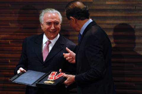 December 6, 2018 - Sao Paulo, Sao Paulo, Brazil - Sao Paulo, Sao Paulo, Brazil - Dec, 2018 - Brazilian President MICHEL TEMER was honored with the industrial merit order at the Federation of Industries of the State of Sao Paulo (FIESP). In the photo the president of the entity, PAULO SKAF (r) delivers the award. Sao Paulo, Brazil, December 06, 2018. Sao Paulo Brazil - ZUMAc168 20181206_zap_c168_003 Copyright: xMarceloxChellox