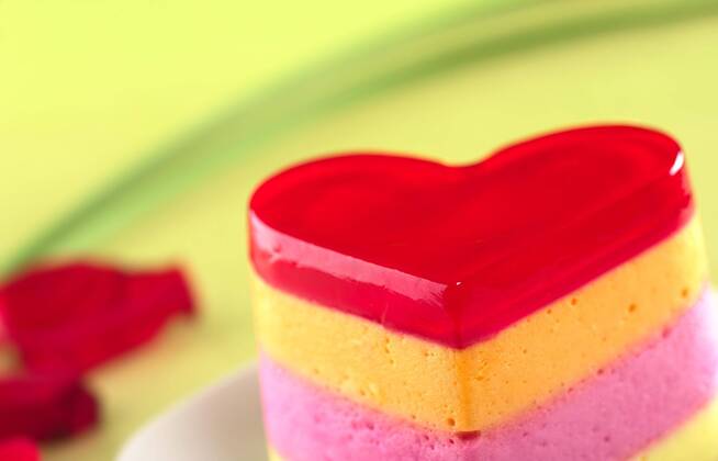 Colorful Peruvian heart-shaped jelly-pudding cake called Torta Helada (Very Shallow Depth of Field, Focus on the tip of the cake)  Copyright: xildix Panthermedia04611070