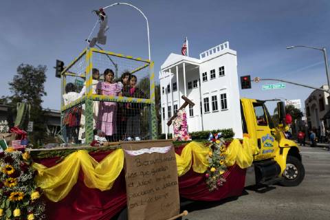 December 9, 2018 - Los Angeles, California, United States - A float containing children in a cage and a replica of the White House, in opposition to the Trump administration s detention of illegal immigrants, takes part in the procession honoring Our Lady of Guadalupe in Los Angeles, California on December 9, 2018. Los Angeles United States - ZUMAn230 20181209_zaa_n230_550 Copyright: xRonenxTivonyx