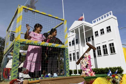 December 9, 2018 - Los Angeles, California, United States - A float containing children in a cage and a replica of the White House, in opposition to the Trump administration s detention of illegal immigrants, takes part in the procession honoring Our Lady of Guadalupe in Los Angeles, California on December 9, 2018. Los Angeles United States - ZUMAn230 20181209_zaa_n230_553 Copyright: xRonenxTivonyx
