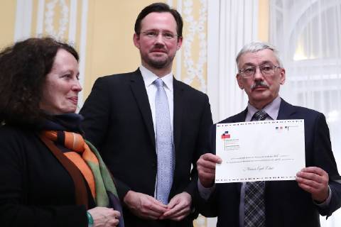 MOSCOW, RUSSIA – DECEMBER 11, 2018: France s Ambassador to Russia Sylvie Bermann, Dirk Wiese, Germany s Coordinator for Intersocietal Cooperation with Russia, and Oleg Orlov (L-R), president of the Memorial human rights centre council, at a ceremony to award human rights activist Oyub Titiyev the Franco-German Prize for Human Rights and the Rule of Law, at the residence of the German Ambassador to Moscow. As Oyub Titiyev, head of the Grozny office of the Memorial human rights centre, charged with possession of marijuana, has been under arrest since 11 January 2018, he could not attend the ceremony. Starting from 2016, France and Germany have been awarding the prize to committed human rights defenders. Stanislav Krasilnikov TASS TS09ADA2