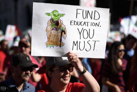 December 15, 2018 - Los Angeles, California, United States - Teachers and supporters of public education march against education funding cuts during the March for Public Education in Los Angeles, California on December 15, 2018. The rally, organized by United Teachers Los Angeles, drew thousands of educators who demanded wage increases and smaller class sizes. Los Angeles United States - ZUMAn230 20181215_zaa_n230_883 Copyright: xRonenxTivonyx