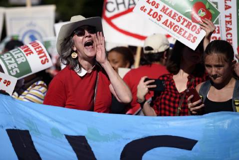December 15, 2018 - Los Angeles, California, United States - Teachers and supporters of public education march against education funding cuts during the March for Public Education in Los Angeles, California on December 15, 2018. The rally, organized by United Teachers Los Angeles, drew thousands of educators who demanded wage increases and smaller class sizes. Los Angeles United States - ZUMAn230 20181215_zaa_n230_898 Copyright: xRonenxTivonyx