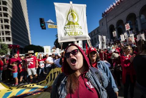 December 15, 2018 - Los Angeles, California, United States - Teachers and supporters of public education march against education funding cuts during the March for Public Education in Los Angeles, California on December 15, 2018. The rally, organized by United Teachers Los Angeles, drew thousands of educators who demanded wage increases and smaller class sizes. Los Angeles United States - ZUMAn230 20181215_zaa_n230_886 Copyright: xRonenxTivonyx