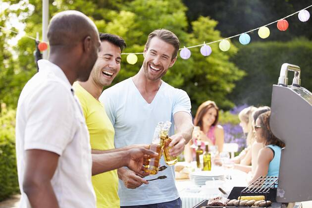  Group Of Men Cooking On Barbeque At Home model released Symbolfoto  Copyright: xMonkeybusinessx Panthermedia19366832