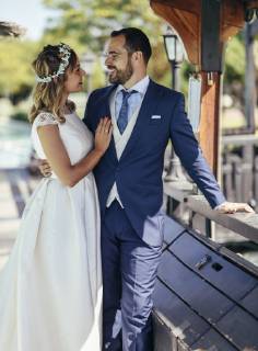 Bridal couple enjoying their wedding day in a park model released Symbolfoto JSMF00577