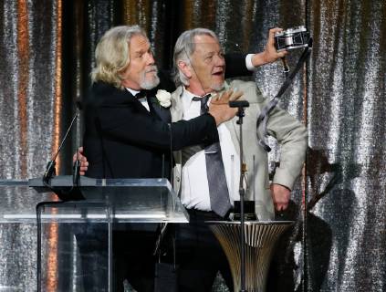 ASC Board of Governors Award honoree Jeff Bridges, left, uses a Widelux panoramic camera to take a photo himself and his stand in and stunt double presenter Loyd Catlett after accepting his award at the 33rd annual ASC Awards and The American Society of Cinematographers 100th Anniversary Celebration at the Ray Dolby Ballroom at Hollywood & Highland, Saturday, February 9, 2019 in Hollywood, California. Photo by Danny Moloshok Moloshok Photography, Inc. imageSPACE MediaPunch Copyright: ximageSPACEx
