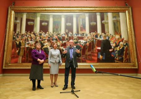 ST PETERSBURG, RUSSIA - FEBRUARY 11, 2019: Russian Museum Director Vladimir Gusev (R) talks to journalists at Mikhailovsky Castle (St Michael s Castle) about the plans to lend a painting by Ilya Repin, Ceremonial meeting of the State Council of 7 May 1901 on the day of the Centenary of its Establishment (behind), to Moscow s Tretyakov Gallery for an exhibition marking Ilya Repin s 175th birthday anniversary. Peter Kovalev TASS  TS0A08EF