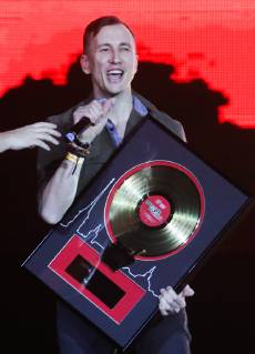 ST PETERSBURG, RUSSIA - FEBRUARY 16, 2019: Lead singer Rustem Bulatov of the Lumen band receives an award at the 2019 Chartova Dyuzhina music award ceremony at VTB Ice Palace. Alexander Demianchuk TASS  TS0A1557