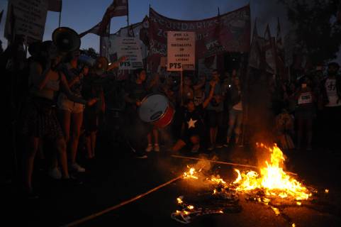 February 27, 2019 - Buenos Aires, Buenos Aires, Argentina - An American flag is burned as left wing parties protest in front of the Embassy of the USA against intervention in the Venezuelan conflict. Buenos Aires Argentina - ZUMAp162 20190227_zap_p162_007 Copyright: xPatricioxMurphyx