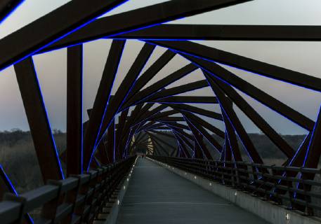 March 22, 2019 - Madrid, Iowa, U.S. - Originally a conduit for rail freight, but now a decomissioned railroad line, the High Trestle Trail Bridge is part of the 25-mile Trestle Trail path for bikers, hikers and horseback riders. The artistic, spiral steel frames springing up from the road bed are a nod to the shape of the timbers placed in former central Iowa coal mines. Madrid U.S. - ZUMAce6_ 20190322_zaf_ce6_016 Copyright: xBrianxCahnx