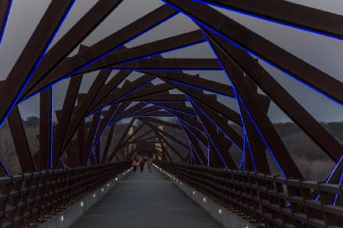 March 22, 2019 - Madrid, Iowa, U.S. - Originally a conduit for rail freight, but now a decomissioned railroad line, the High Trestle Trail Bridge is part of the 25-mile Trestle Trail path for bikers, hikers and horseback riders. The artistic, spiral steel frames springing up from the road bed are a nod to the shape of the timbers placed in former central Iowa coal mines. Madrid U.S. - ZUMAce6_ 20190322_zaf_ce6_018 Copyright: xBrianxCahnx