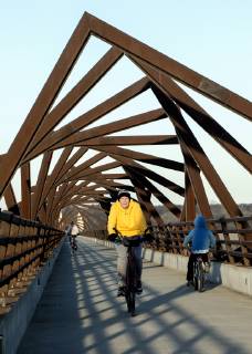 March 22, 2019 - Madrid, Iowa, U.S. - Originally a conduit for rail freight, but now a decomissioned railroad line, the High Trestle Trail Bridge is part of the 25-mile Trestle Trail path for bikers, hikers and horseback riders. The artistic, spiral steel frames springing up from the road bed are a nod to the shape of the timbers placed in former central Iowa coal mines. Madrid U.S. - ZUMAce6_ 20190322_zaf_ce6_010 Copyright: xBrianxCahnx