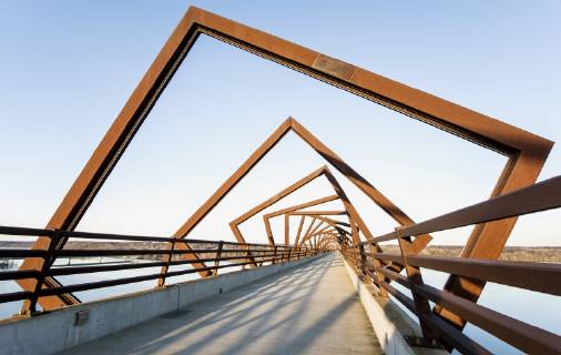 March 22, 2019 - Madrid, Iowa, U.S. - Originally a conduit for rail freight, but now a decomissioned railroad line, the High Trestle Trail Bridge is part of the 25-mile Trestle Trail path for bikers, hikers and horseback riders. The artistic, spiral steel frames springing up from the road bed are a nod to the shape of the timbers placed in former central Iowa coal mines. Madrid U.S. - ZUMAce6_ 20190322_zaf_ce6_011 Copyright: xBrianxCahnx