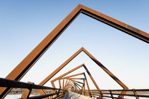 March 22, 2019 - Madrid, Iowa, U.S. - Originally a conduit for rail freight, but now a decomissioned railroad line, the High Trestle Trail Bridge is part of the 25-mile Trestle Trail path for bikers, hikers and horseback riders. The artistic, spiral steel frames springing up from the road bed are a nod to the shape of the timbers placed in former central Iowa coal mines. Madrid U.S. - ZUMAce6_ 20190322_zaf_ce6_012 Copyright: xBrianxCahnx