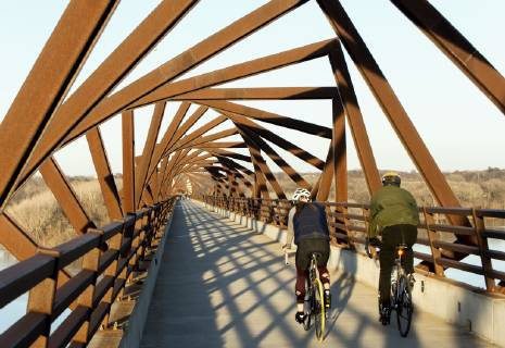 March 22, 2019 - Madrid, Iowa, U.S. - Originally a conduit for rail freight, but now a decomissioned railroad line, the High Trestle Trail Bridge is part of the 25-mile Trestle Trail path for bikers, hikers and horseback riders. The artistic, spiral steel frames springing up from the road bed are a nod to the shape of the timbers placed in former central Iowa coal mines. Madrid U.S. - ZUMAce6_ 20190322_zaf_ce6_014 Copyright: xBrianxCahnx