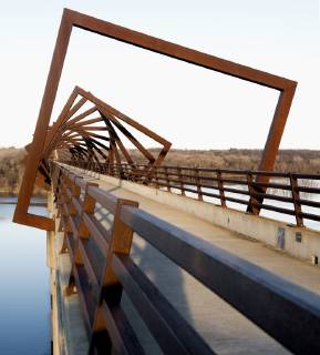 March 22, 2019 - Madrid, Iowa, U.S. - Originally a conduit for rail freight, but now a decomissioned railroad line, the High Trestle Trail Bridge is part of the 25-mile Trestle Trail path for bikers, hikers and horseback riders. The artistic, spiral steel frames springing up from the road bed are a nod to the shape of the timbers placed in former central Iowa coal mines. Madrid U.S. - ZUMAce6_ 20190322_zaf_ce6_008 Copyright: xBrianxCahnx