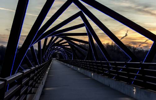 March 22, 2019 - Madrid, Iowa, U.S. - Originally a conduit for rail freight, but now a decomissioned railroad line, the High Trestle Trail Bridge is part of the 25-mile Trestle Trail path for bikers, hikers and horseback riders. The artistic, spiral steel frames springing up from the road bed are a nod to the shape of the timbers placed in former central Iowa coal mines. Madrid U.S. - ZUMAce6_ 20190322_zaf_ce6_001 Copyright: xBrianxCahnx