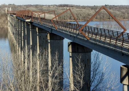 March 22, 2019 - Madrid, Iowa, U.S. - Originally a conduit for rail freight, but now a decomissioned railroad line, the High Trestle Trail Bridge is part of the 25-mile Trestle Trail path for bikers, hikers and horseback riders. The artistic, spiral steel frames springing up from the road bed are a nod to the shape of the timbers placed in former central Iowa coal mines. Madrid U.S. - ZUMAce6_ 20190322_zaf_ce6_004 Copyright: xBrianxCahnx