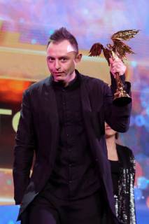 MOSCOW, RUSSIA â€“ MARCH 30, 2019: Musician and actor Roma Zver accepts an award for Breakthrough Actor for his role in Kirill Serebrennikov s film Leto Summer at the 32nd Nika Film Award Ceremony. Vyacheslav Prokofyev TASS  TS0A66E7