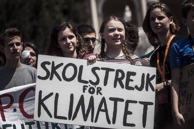 Italy: Global Climate Strike for Future in Rome Swedish climate change activist Greta Thunberg speaks during the Fridays For Future rally in Piazza del Popolo to demand action to prevent further global warming and climate change. Rome Latium Italy Piazza del Popolo  GiuseppexCiccia
