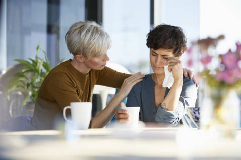 Woman consoling crying friend model released Symbolfoto property released RBF06964