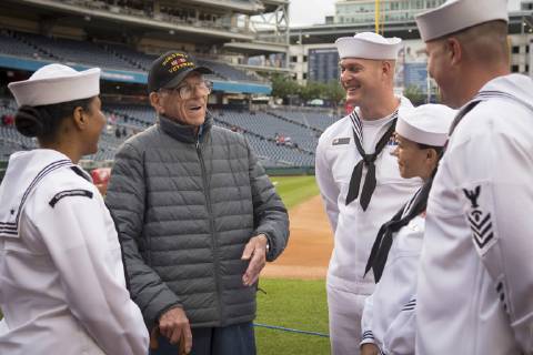 May 15, 2019 - Washington, District of Columbia, U.S. - The Navy Sailors of the Year speak to World War II veteran Walter Green at Nationals Park in Washington, D.C. The Washington Nationals honored the Navy Sailors of the Year (SOY) during a pre-game ceremony. The program was established in 1972 by Chief of Naval Operations Adm. Elmo Zumwalt and Master Chief Petty Officer of the Navy John Whittet to recognize an individual Sailor who best represented the ever-growing group of dedicated professional Sailors at each command and ultimately the Navy. SOY finalists participated in a variety of leadership, naval heritage and team-building events throughout the week around Washington D.C. Washington U.S. - ZUMAz03_ 20190515_sha_z03_861 Copyright: xU.S.xNavyx