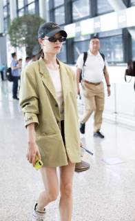 Chinese actress Zhong Chuxi arrives at the Shanghai Hongqiao International Airport before departure in Shanghai, China, 23 May 2019. Handbag: Louis Vuitton Zhong Chuxi arrives at Shanghai airport before departure bjl9767072