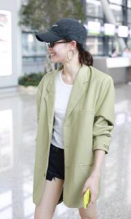 Chinese actress Zhong Chuxi arrives at the Shanghai Hongqiao International Airport before departure in Shanghai, China, 23 May 2019. Handbag: Louis Vuitton Zhong Chuxi arrives at Shanghai airport before departure bjl9767081