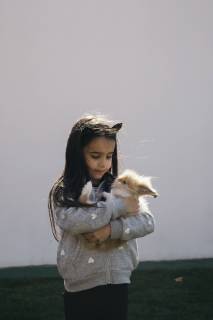 Girl holding a bunny model released Symbolfoto property released  MOMF00686