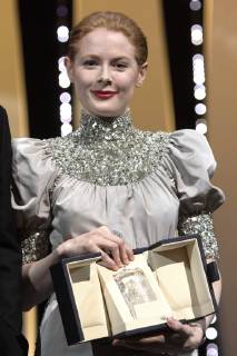 Emily Beecham with the Best Actress award for her role in Little Joe at the award ceremony during the 72nd Cannes Film Festival at the Palais des Festivals on May 25, 2019 in Cannes, France