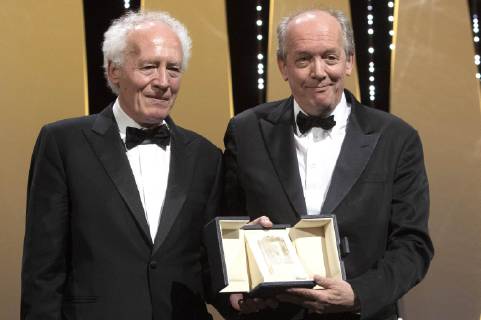 Jean-Pierre Dardenne and Luc Dardenne accept the Best Director Award for their movie Le Jeune Ahmed Young Ahmed at the award ceremony during the 72nd Cannes Film Festival at the Palais des Festivals on May 25, 2019 in Cannes, France