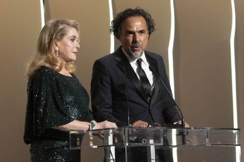 Catherine Deneuve and Alejandro Gonzalez Inarritu at the award ceremony during the 72nd Cannes Film Festival at the Palais des Festivals on May 25, 2019 in Cannes, France