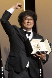 Bong Joon-ho with his Palme d Or (Golden Palm) for the movie Parasite Gisaengchung at the award ceremony during the 72nd Cannes Film Festival at the Palais des Festivals on May 25, 2019 in Cannes, France