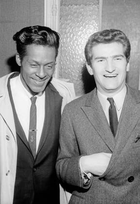 Chuck Berry and Eddy Mitchell, 1965 French singer Eddy Mitchell in the backstages of the Paris Olympia Hall has come to attend the concert of Chuck Berry. Paris, February 1965 Photo AndrÃ© Crudo Copyright: xAndrÃ©xCrudo Photo12x ACD17A00106