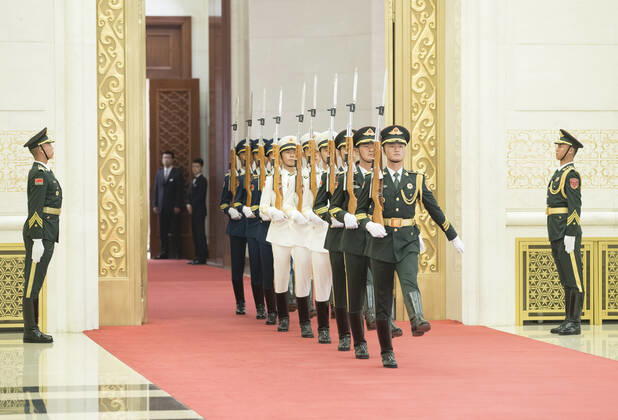(190929) -- BEIJING, Sept. 29, 2019 -- Guards of honor enter the venue of the presentation ceremony at the Great Hall of the People in Beijing, capital of China, Sept. 29, 2019. China held the presentation ceremony for national medals and national honorary titles on Sunday at the Great Hall of the People, ahead of the 70th anniversary of the founding of the People s Republic of China (PRC) on Oct. 1. ) CHINA-BEIJING-NATIONAL MEDALS-HONORARY TITLES-PRC FOUNDING-70TH ANNIVERSARY (CN) WangxYe 