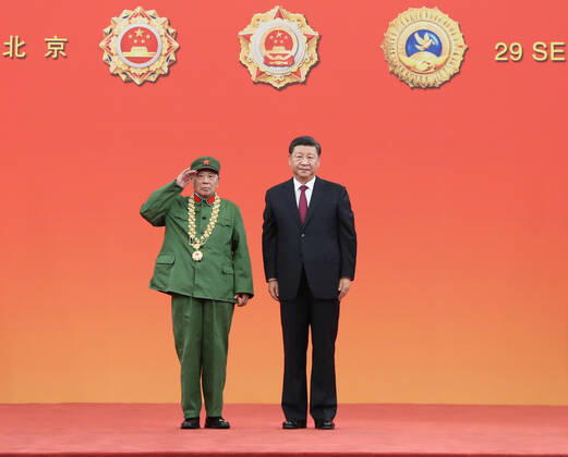 (190929) -- BEIJING, Sept. 29, 2019 -- Chinese President Xi Jinping, also general secretary of the Communist Party of China Central Committee and chairman of the Central Military Commission, presents the Medal of the Republic to Li Yannian at the presentation ceremony of the national medals and honorary titles of the People s Republic of China at the Great Hall of the People in Beijing, capital of China, Sept. 29, 2019. ) CHINA-BEIJING-NATIONAL MEDALS AND HONORARY TITLES-PRESENTATION CEREMONY (CN) WangxYe 