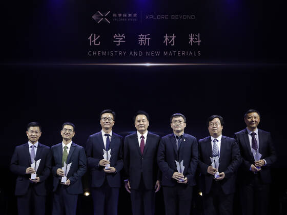 (191102) -- BEIJING, Nov. 2, 2019 -- Awardees of Xplorer Prize in chemistry and new materials field pose for a group photo with the presenter during the 2019 Xplorer Prize award ceremony in Beijing, capital of China, Nov. 2, 2019. The 2019 Xplorer Prizeawards ceremony kicked off here on Saturday. The Xplorer Prize was jointly initiated by Tencent Chairman and CEO Pony Ma and 14 scientists in 2018 to support full-time Chinese mainland-based scientists under age of 45 in areas of fundamental science and cutting-edge technologies. The 50 winners were from 26 organizations across China, including research institutions, universities and an enterprise. Nine of them were under the age of 35. ) CHINA-BEIJING-XPLORER PRIZE-AWARDS CEREMONY (CN) ShenxBohan 