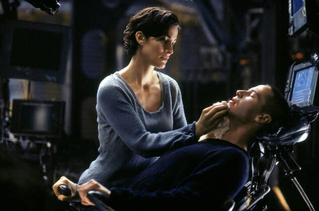 Carrie-Anne Moss & Keanu Reeves Characters: Trinity, Neo Film: The Matrix (USA AUS 1999) Director: The Wachowski Brothers 31 March 1999  Copyright: MaryxEvansxAFxArchivexWarnerxBros. 12574466 editorial use only