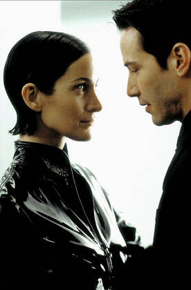 Carrie-Anne Moss & Keanu Reeves Characters: Trinity & Neo Film: The Matrix Revolutions (USA AUS 2003) Director: Andy Wachowski, L. Wachowski 27 October 2003  Copyright: MaryxEvansxAFxArchivexWarnerxBros. 12630992 editorial use only