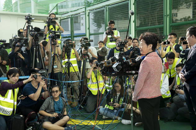 November 24, 2019, Hong Kong, Hong Kong SAR, China: Hong Kong Chief Executive, CARRIE LAM, votes in the local council elections. Lam meets the press at Raymond College in Midlevels Central to cast her vote in an election predicted to show Hong Kongers true views following 5 months of protests. Hong Kong China - ZUMAr144 20191124_zap_r144_001 Copyright: xJaynexRussellx