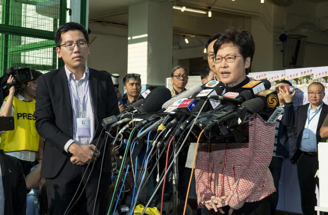 November 24, 2019, Hong Kong, Hong Kong SAR, China: Hong Kong Chief Executive, CARRIE LAM, votes in the local council elections. Lam meets the press at Raymond College in Midlevels Central to cast her vote in an election predicted to show Hong Kongers true views following 5 months of protests. Hong Kong China - ZUMAr144 20191124_zap_r144_005 Copyright: xJaynexRussellx