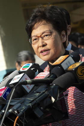 November 24, 2019, Hong Kong, Hong Kong SAR, China: Hong Kong Chief Executive, CARRIE LAM, votes in the local council elections. Lam meets the press at Raymond College in Midlevels Central to cast her vote in an election predicted to show Hong Kongers true views following 5 months of protests. Hong Kong China - ZUMAr144 20191124_zap_r144_004 Copyright: xJaynexRussellx