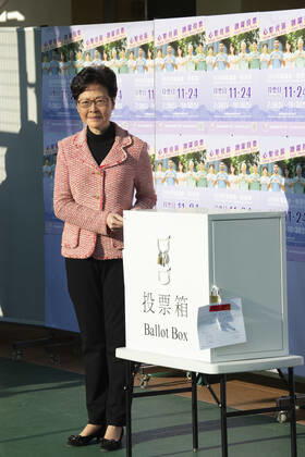 November 24, 2019, Hong Kong, Hong Kong SAR, China: Hong Kong Chief Executive, CARRIE LAM, votes in the local council elections. Lam meets the press at Raymond College in Midlevels Central to cast her vote in an election predicted to show Hong Kongers true views following 5 months of protests. Hong Kong China - ZUMAr144 20191124_zap_r144_009 Copyright: xJaynexRussellx