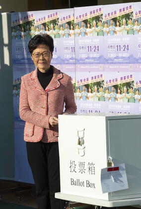 November 24, 2019, Hong Kong, Hong Kong SAR, China: Hong Kong Chief Executive, CARRIE LAM, votes in the local council elections. Lam meets the press at Raymond College in Midlevels Central to cast her vote in an election predicted to show Hong Kongers true views following 5 months of protests. Hong Kong China - ZUMAr144 20191124_zap_r144_011 Copyright: xJaynexRussellx