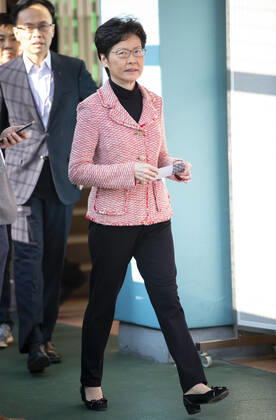 November 24, 2019, Hong Kong, Hong Kong SAR, China: Hong Kong Chief Executive, CARRIE LAM, votes in the local council elections. Lam meets the press at Raymond College in Midlevels Central to cast her vote in an election predicted to show Hong Kongers true views following 5 months of protests. Hong Kong China - ZUMAr144 20191124_zap_r144_014 Copyright: xJaynexRussellx