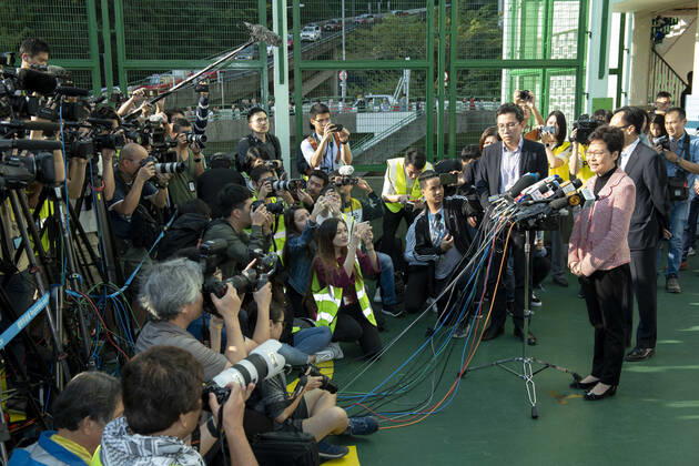 November 24, 2019, Hong Kong, Hong Kong SAR, China: Hong Kong Chief Executive, CARRIE LAM, votes in the local council elections. Lam meets the press at Raymond College in Midlevels Central to cast her vote in an election predicted to show Hong Kongers true views following 5 months of protests. Hong Kong China - ZUMAr144 20191124_zap_r144_007 Copyright: xJaynexRussellx
