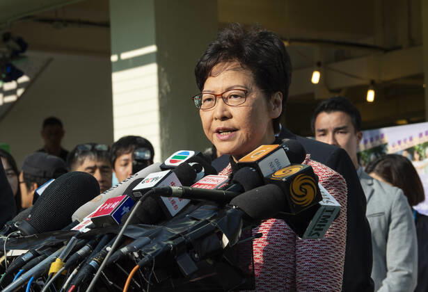 November 24, 2019, Hong Kong, Hong Kong SAR, China: Hong Kong Chief Executive, CARRIE LAM, votes in the local council elections. Lam meets the press at Raymond College in Midlevels Central to cast her vote in an election predicted to show Hong Kongers true views following 5 months of protests. Hong Kong China - ZUMAr144 20191124_zap_r144_018 Copyright: xJaynexRussellx