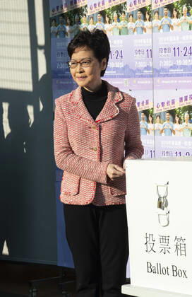 November 24, 2019, Hong Kong, Hong Kong SAR, China: Hong Kong Chief Executive, CARRIE LAM, votes in the local council elections. Lam meets the press at Raymond College in Midlevels Central to cast her vote in an election predicted to show Hong Kongers true views following 5 months of protests. Hong Kong China - ZUMAr144 20191124_zap_r144_020 Copyright: xJaynexRussellx